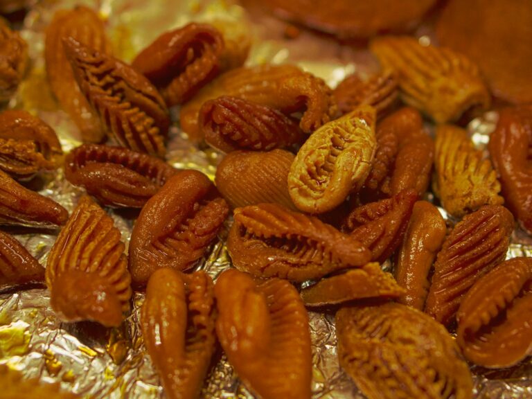 a pile of nuts sitting on top of foil